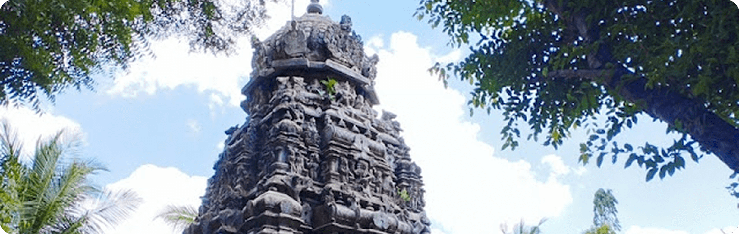 Ornate stone gopuram of Sri Agasteeswarar Temple