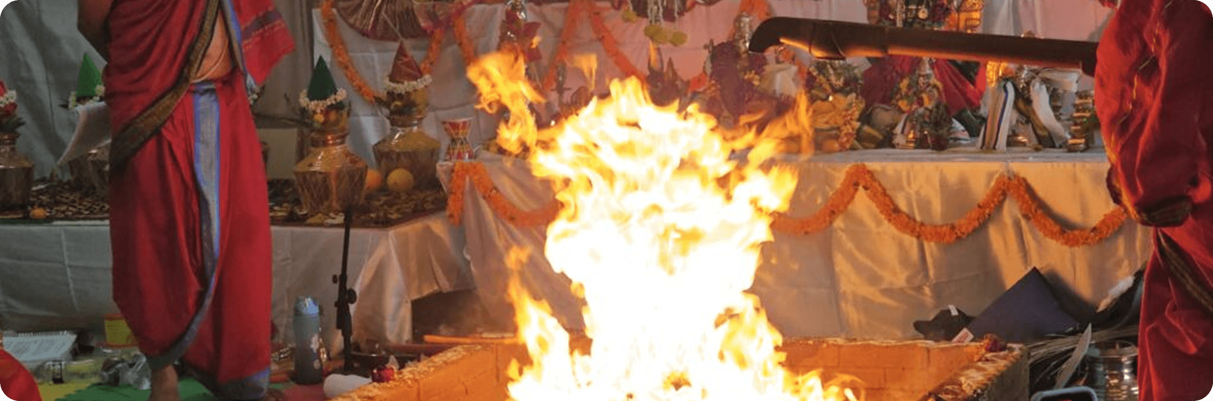Priests performing Chandi Homam with sacred fire