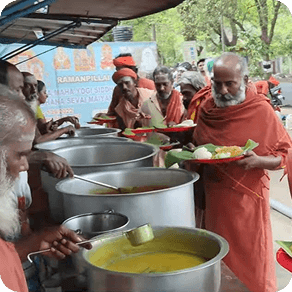 Annadhanam seva with devotees seated in rows