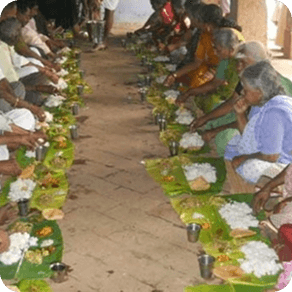 Volunteers serving sacred food
